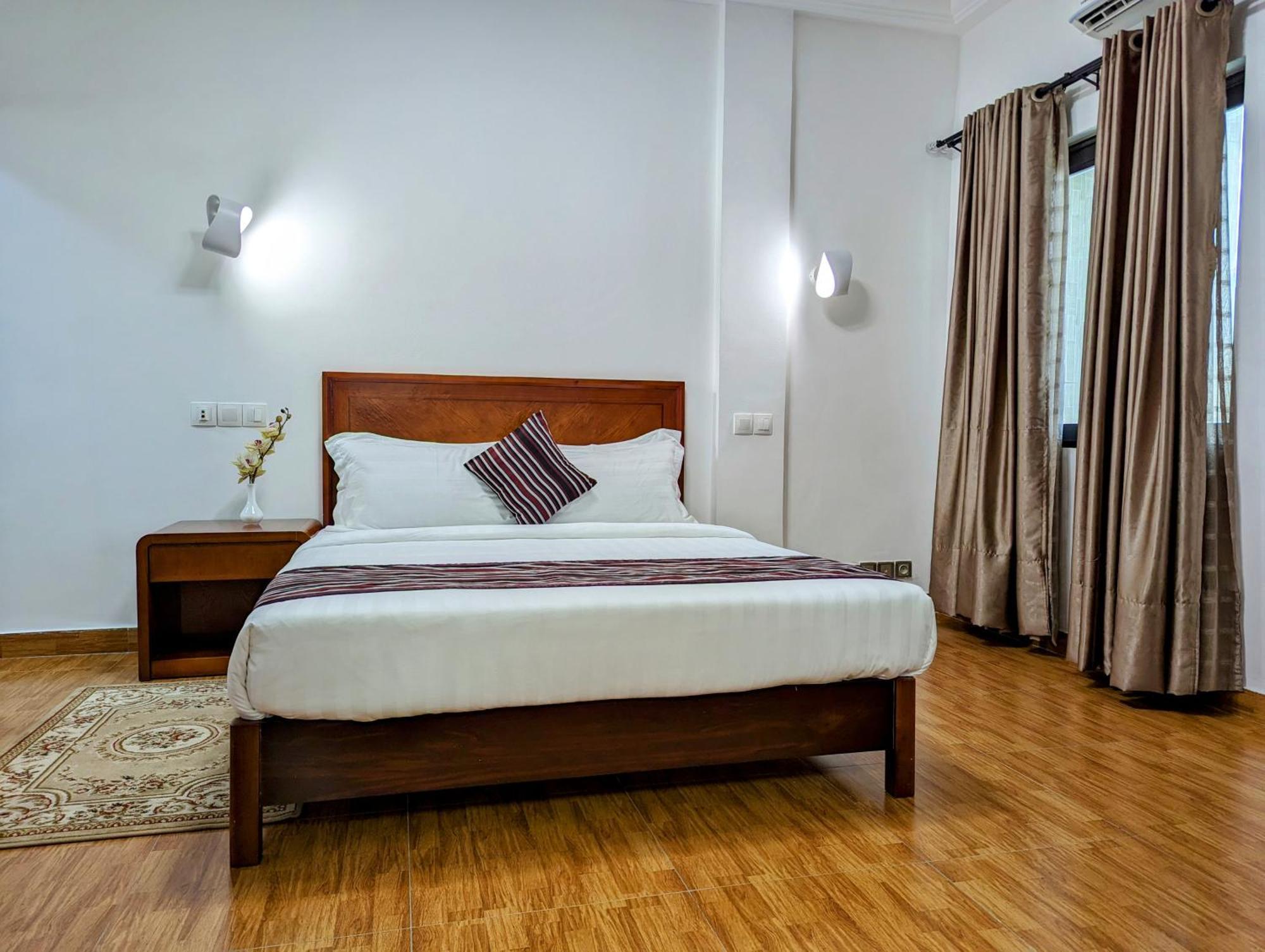 Les Ombrelles Appart'Hotel Котону Экстерьер фото