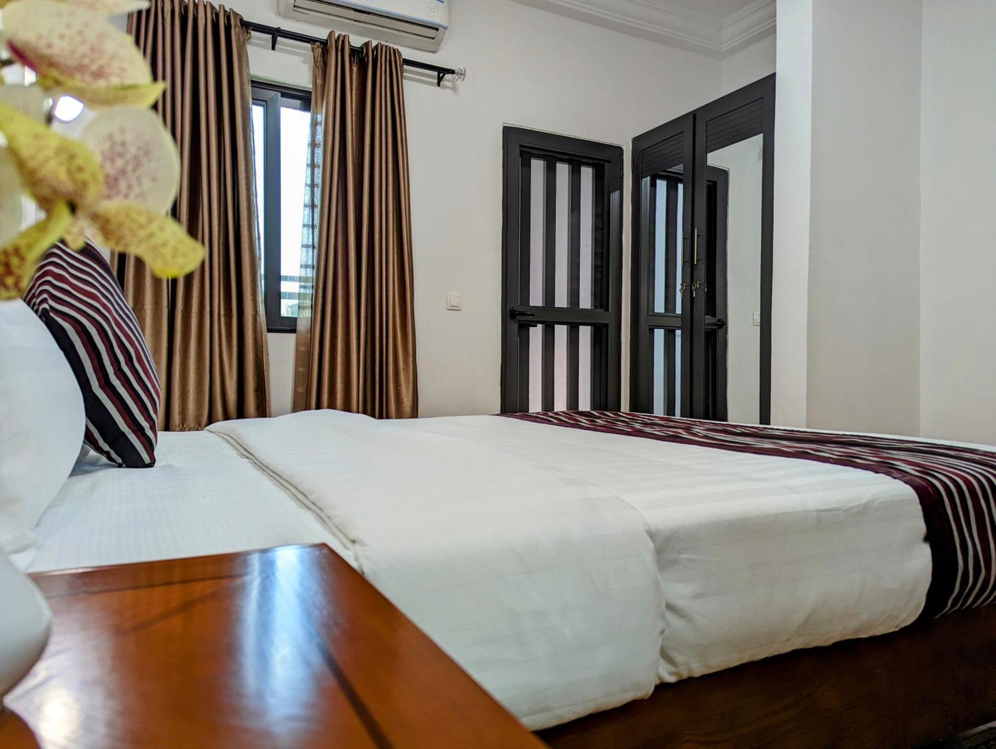 Les Ombrelles Appart'Hotel Котону Экстерьер фото